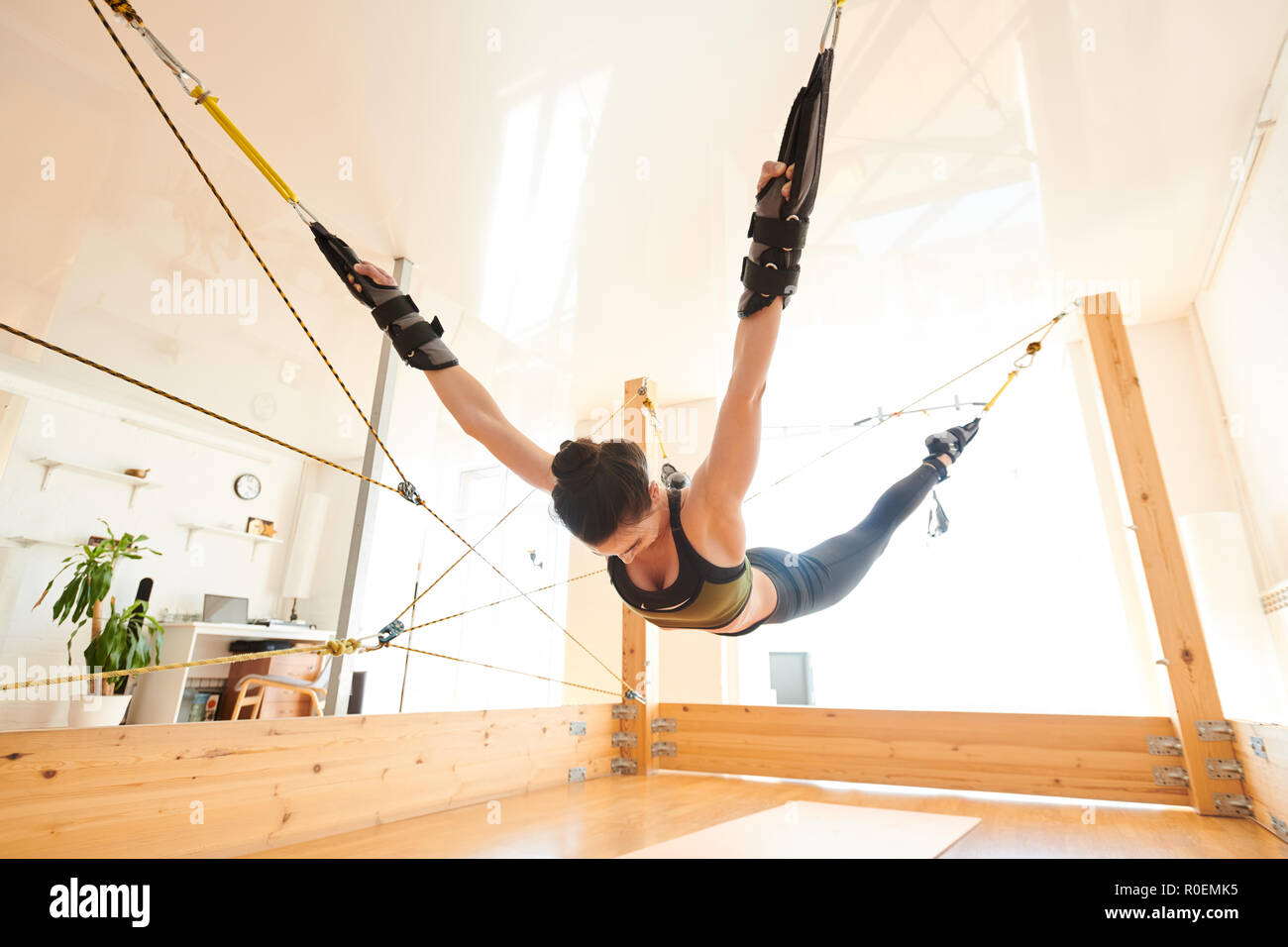 Antigravity yoga exercise Stock Photo Alamy
