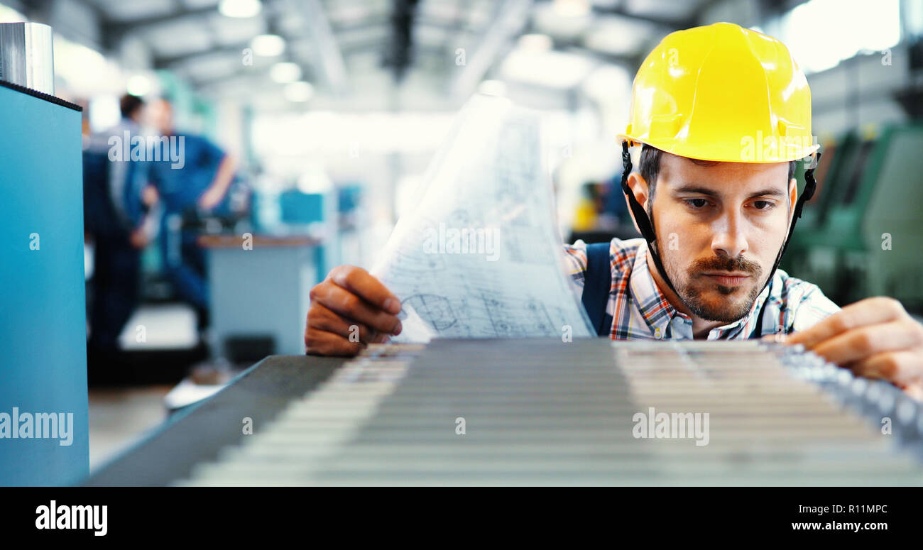 modern industrial machine operator working in factory Stock Photo Alamy
