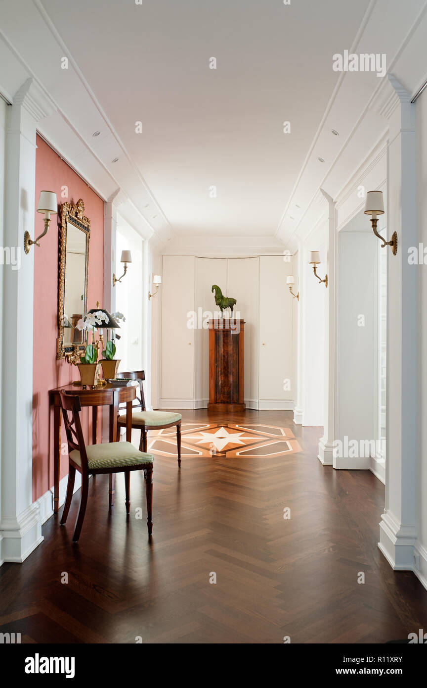 Chairs and table in hallway Stock Photo Alamy