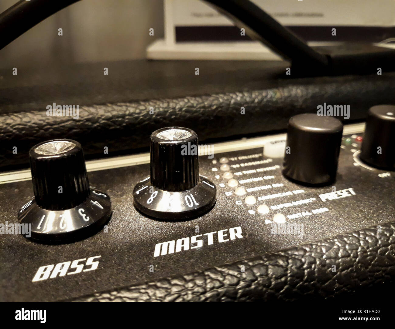 Guitar amplifier knobs closeup. Bass, Master, Presets Stock Photo Alamy