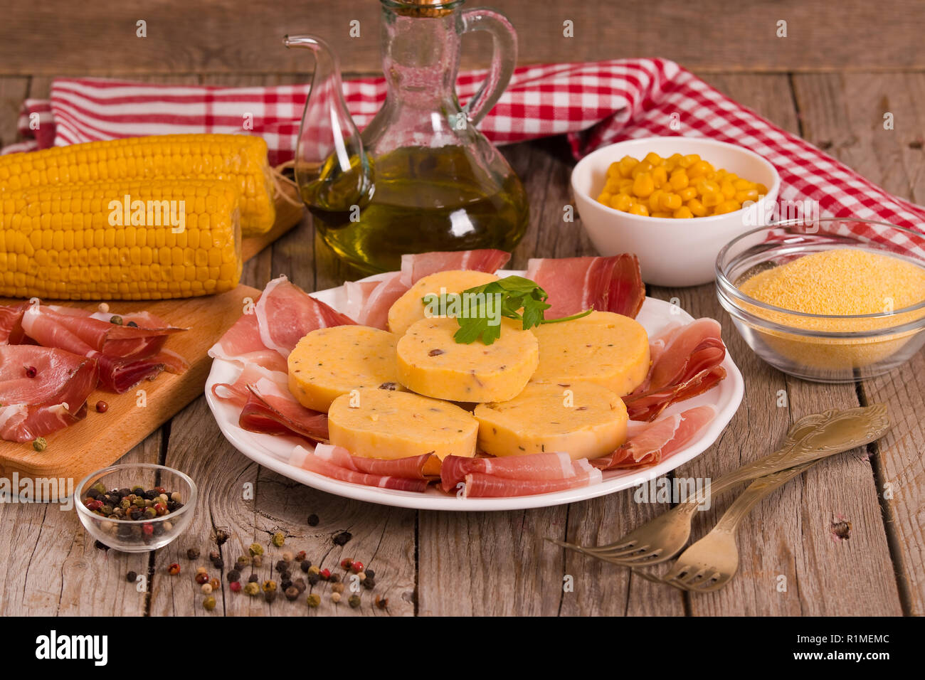 Speck ham and polenta Stock Photo Alamy