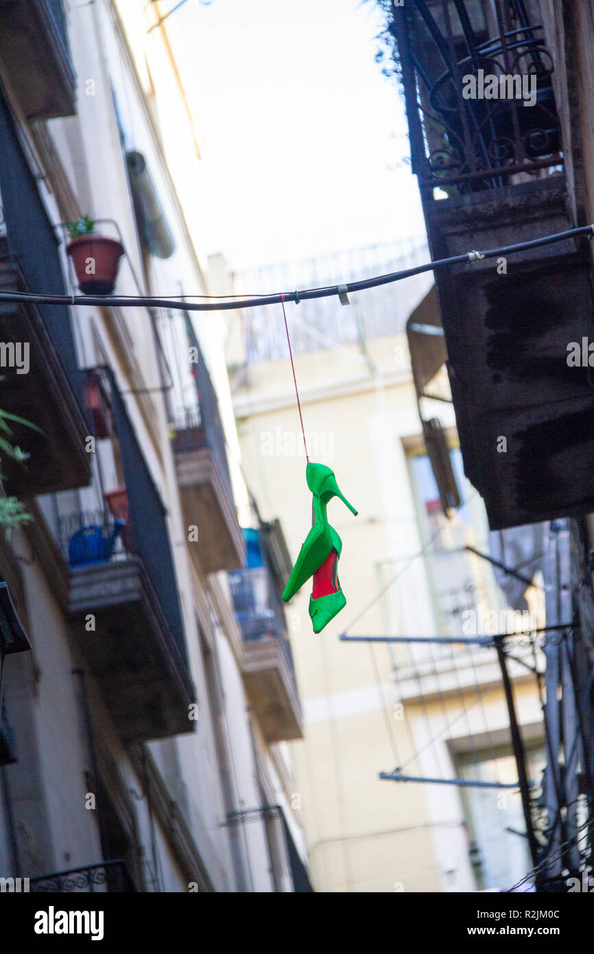 Shoes hanging from telephone wire Stock Photo Alamy