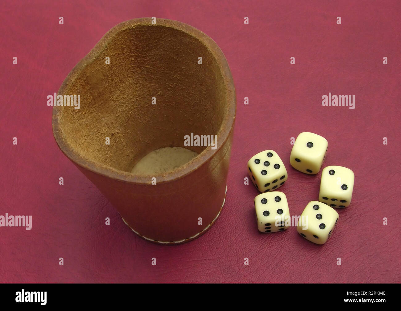 standing dice cup and dice Stock Photo Alamy