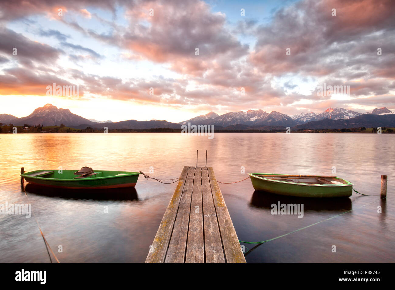 rowing boat on alpine lake Stock Photo Alamy