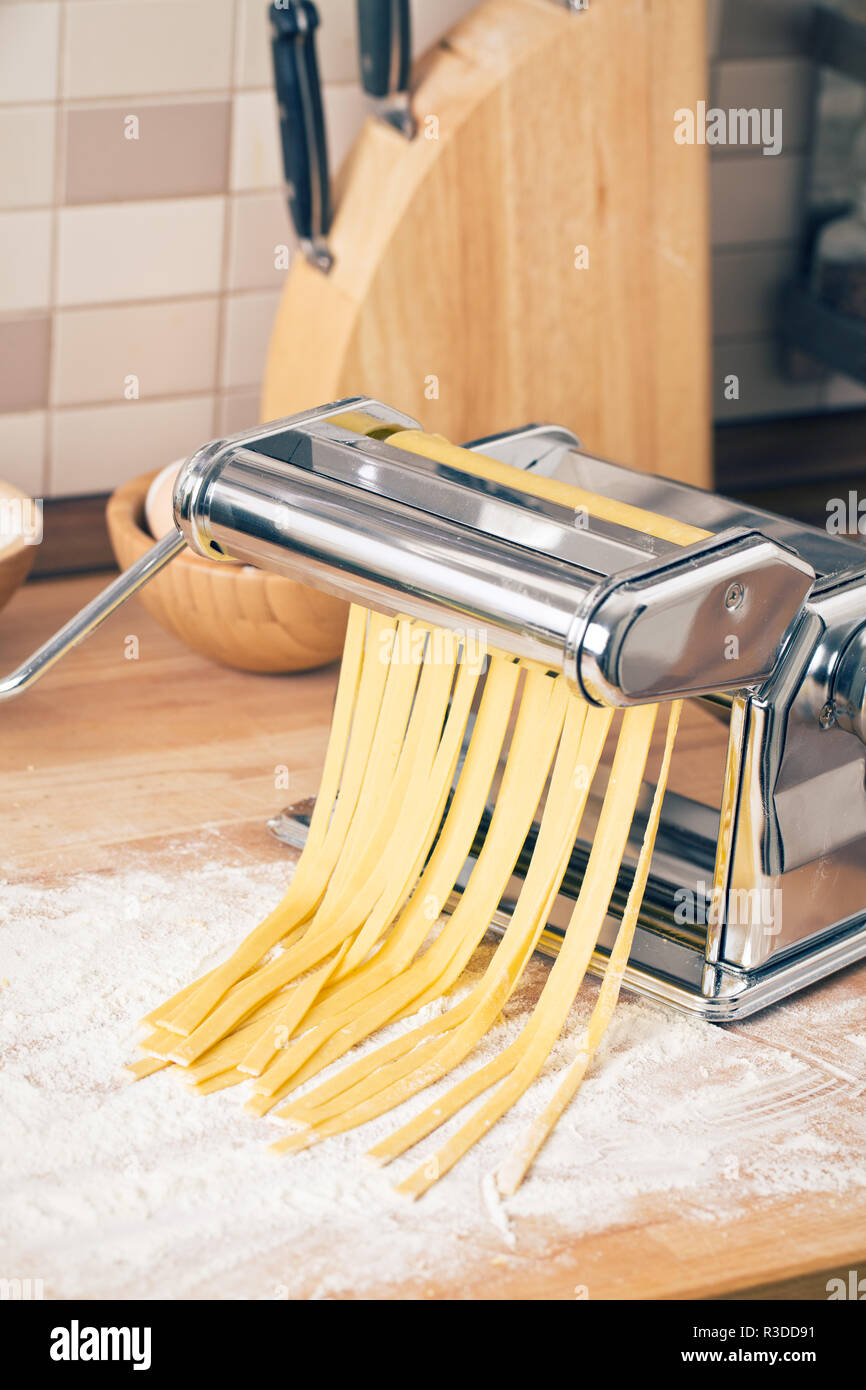 Vintage italian pasta making machine hires stock photography and