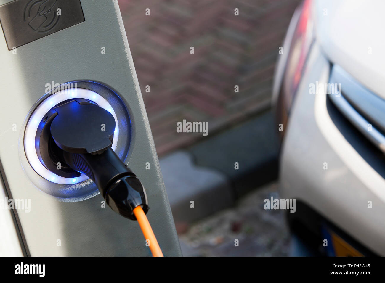 Electric car charging Stock Photo Alamy