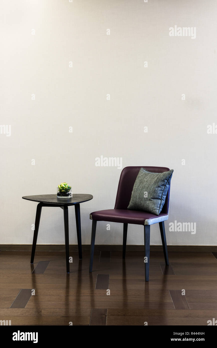 Coffee table Leather chair combination Stock Photo Alamy