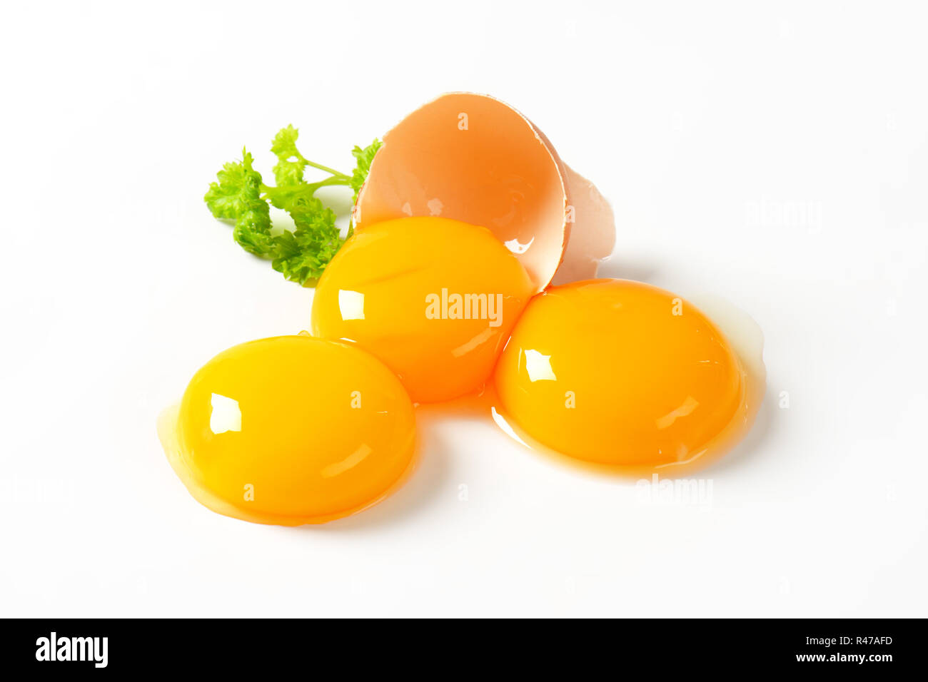Raw egg yolks Stock Photo Alamy