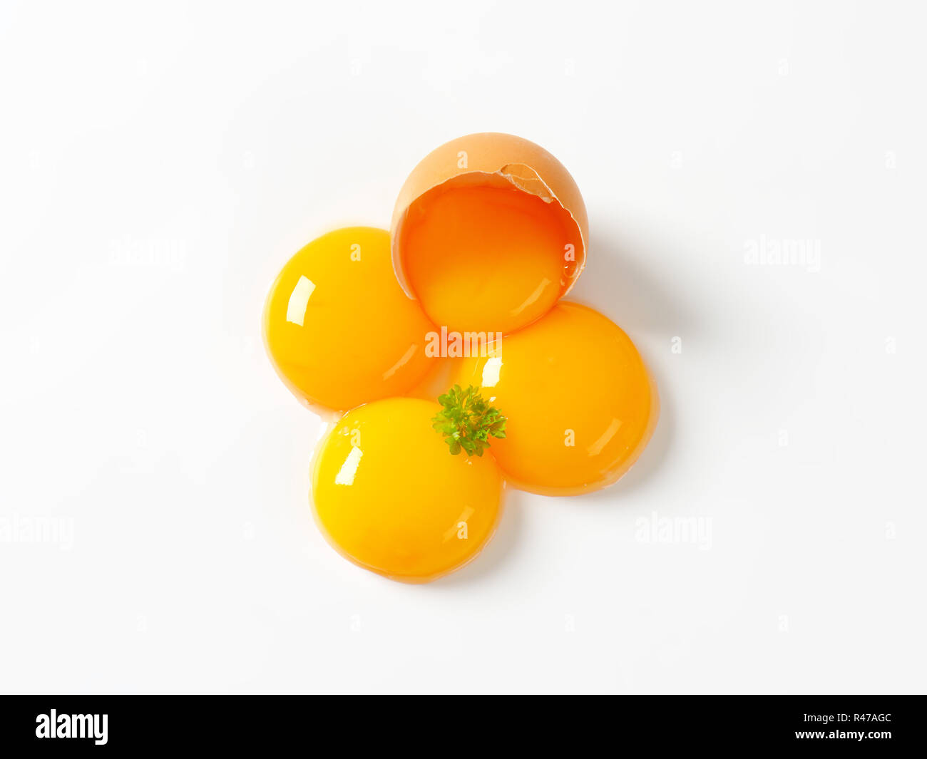 Raw egg yolks Stock Photo Alamy
