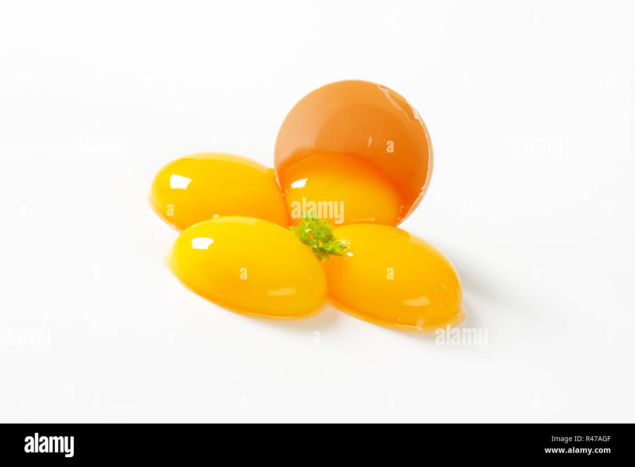 Raw egg yolks Stock Photo Alamy