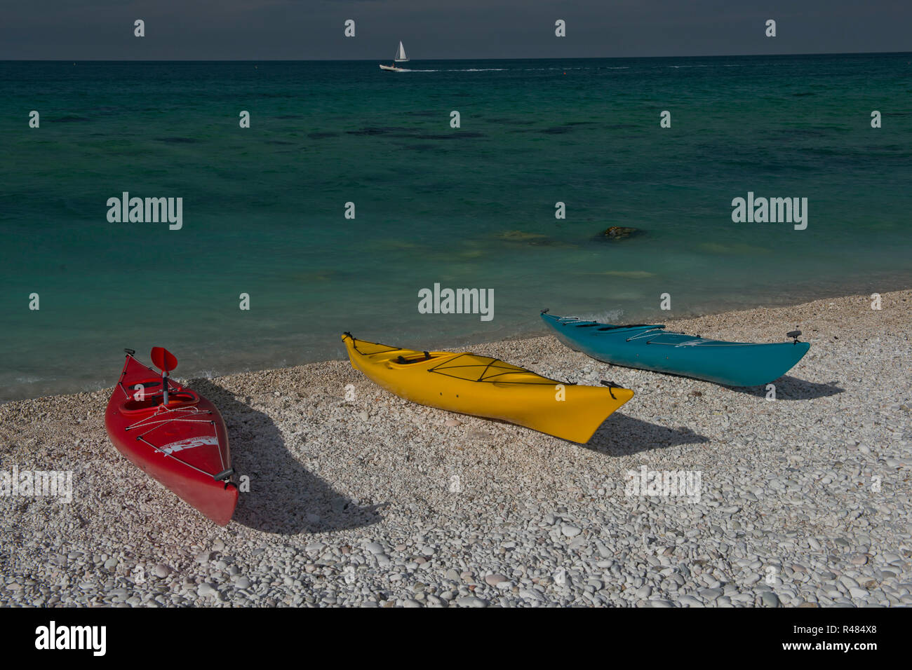 Three Canoes on the Beach Stock Photo Alamy