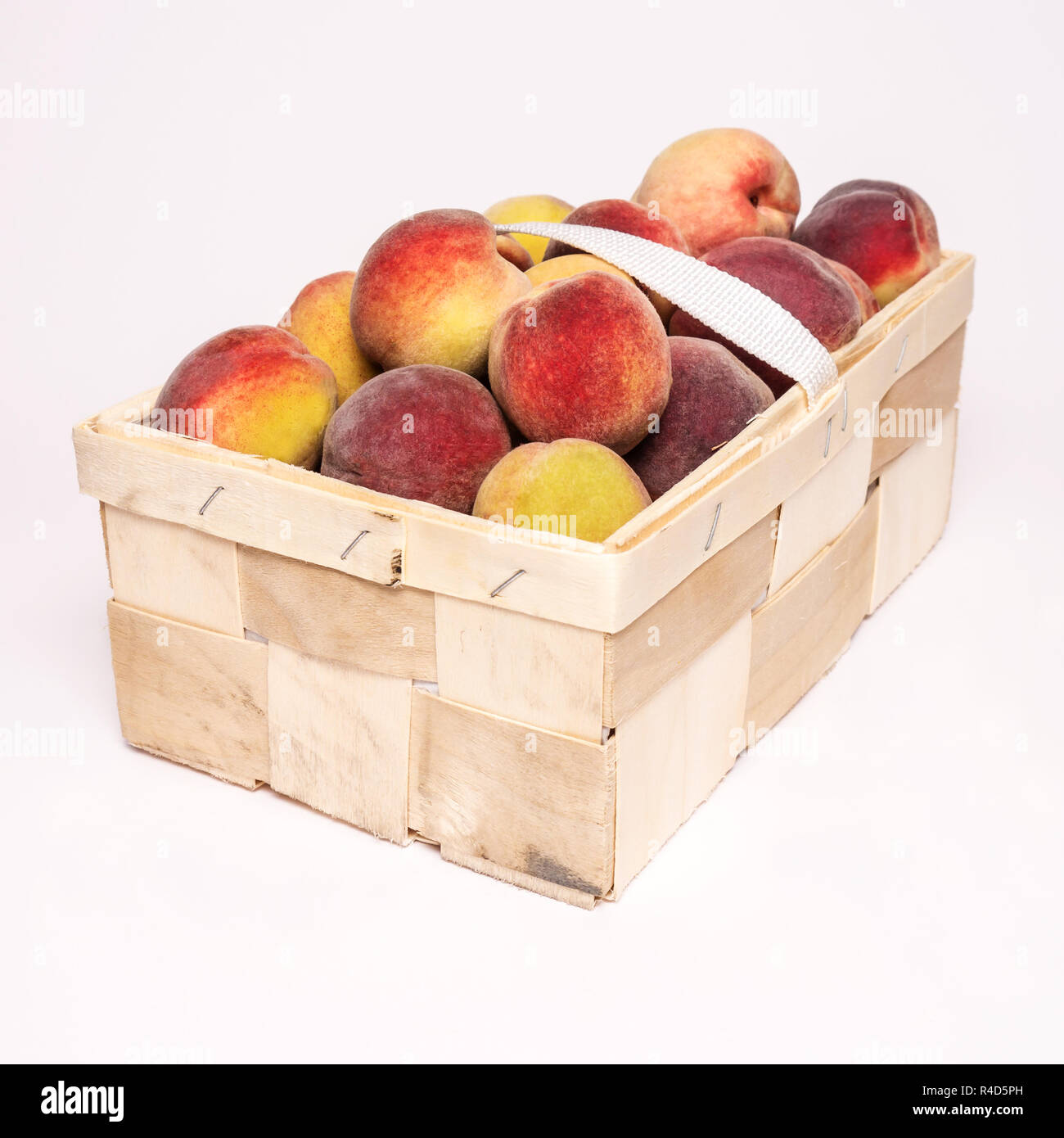 peaches in basket Stock Photo Alamy