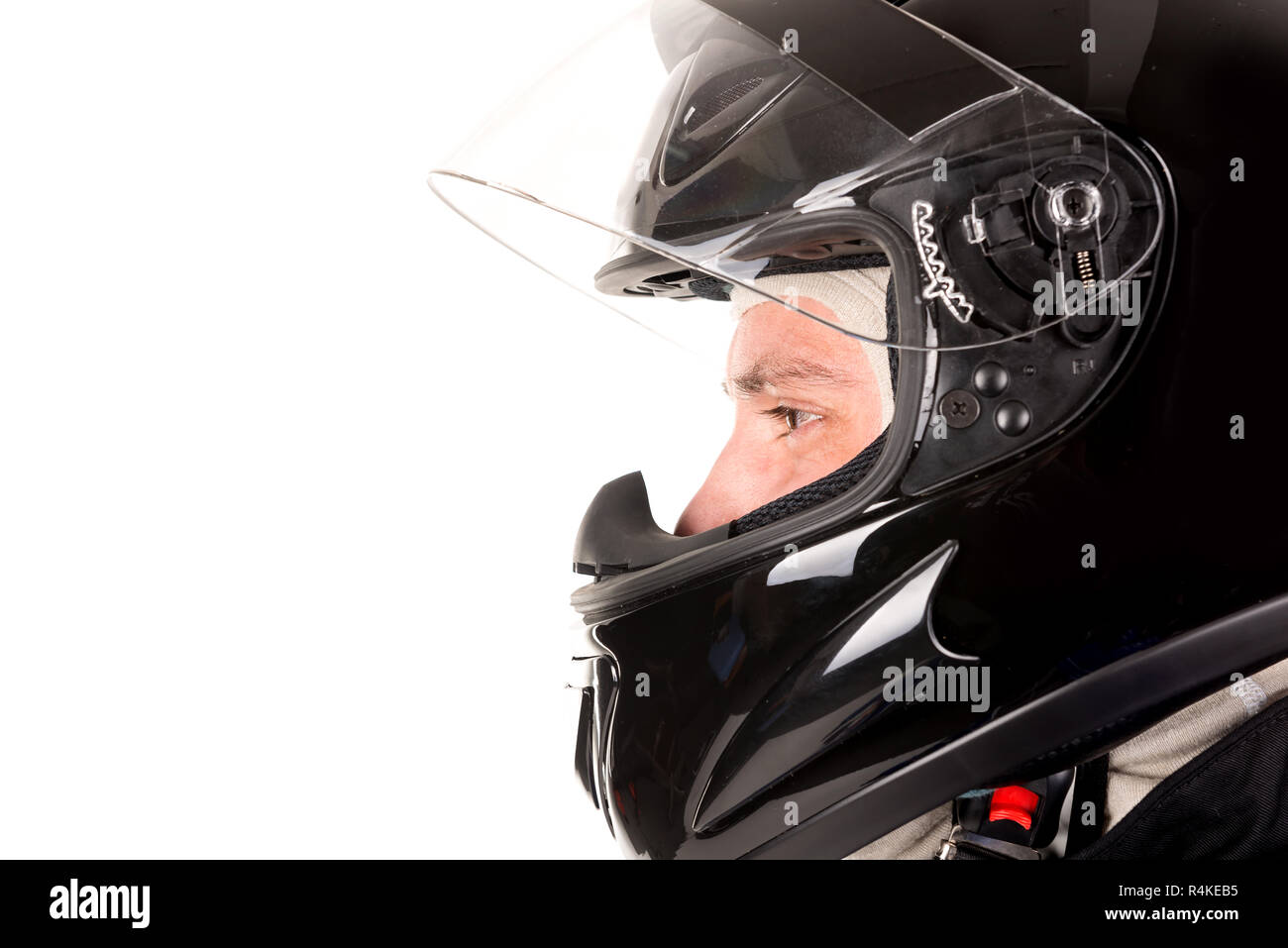 Racing driver with helmet Stock Photo Alamy
