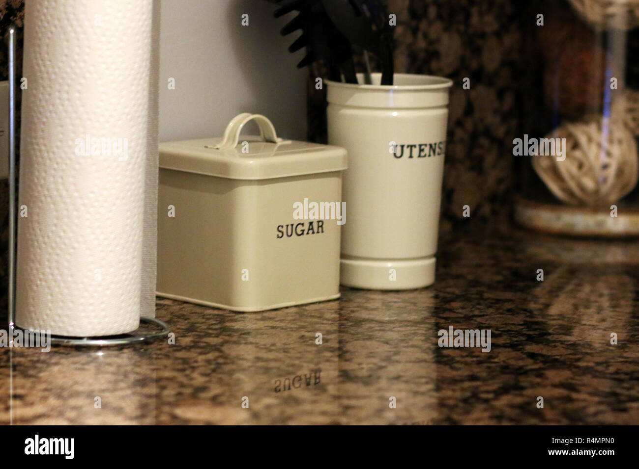 The kitchen containers are on the granite surface Stock Photo Alamy