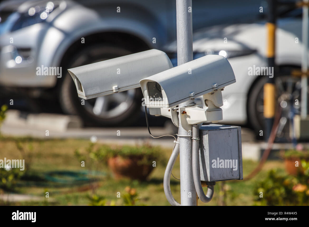 CCTV security camera at car park Stock Photo Alamy