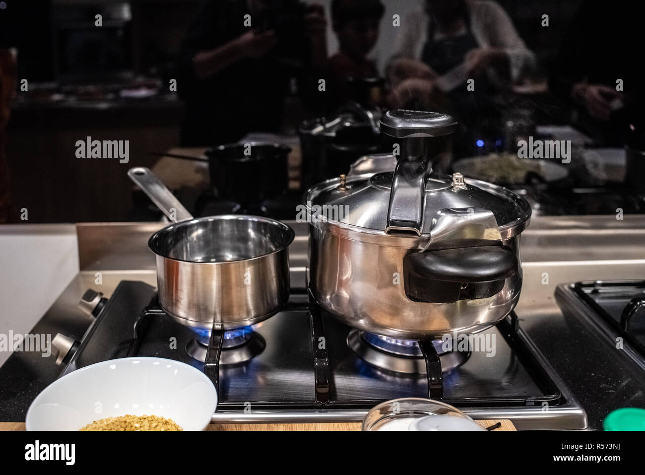 Kitchen cookware with large pots on fire Stock Photo Alamy