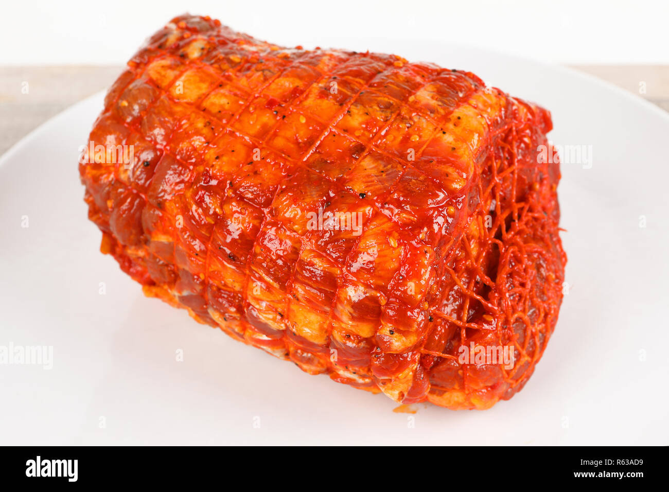 raw and marinated spit roast Stock Photo Alamy