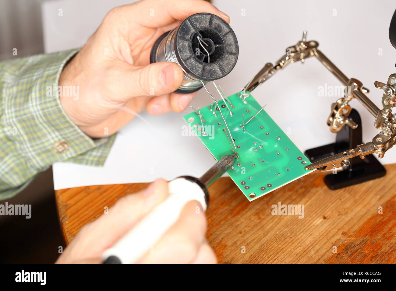 solder components on board Stock Photo Alamy