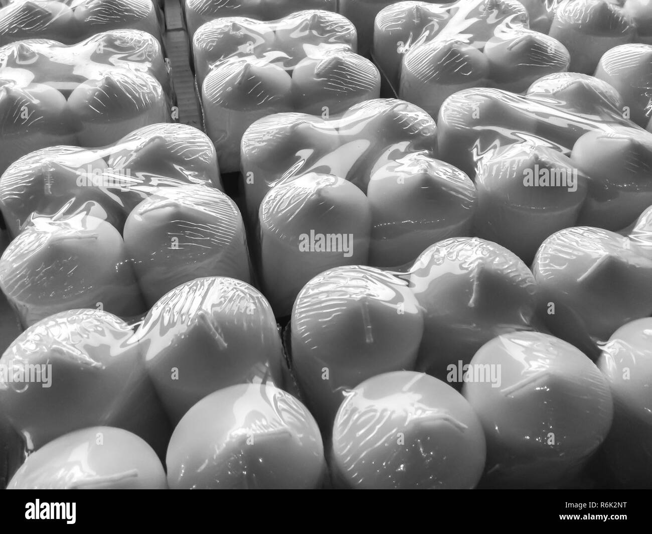 Candles in plastic wrap Stock Photo Alamy