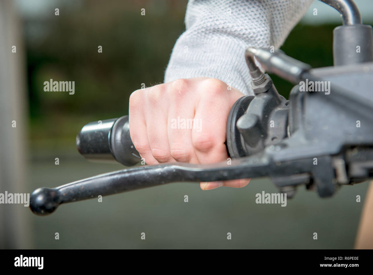 driving a motorcycle without gloves Stock Photo Alamy