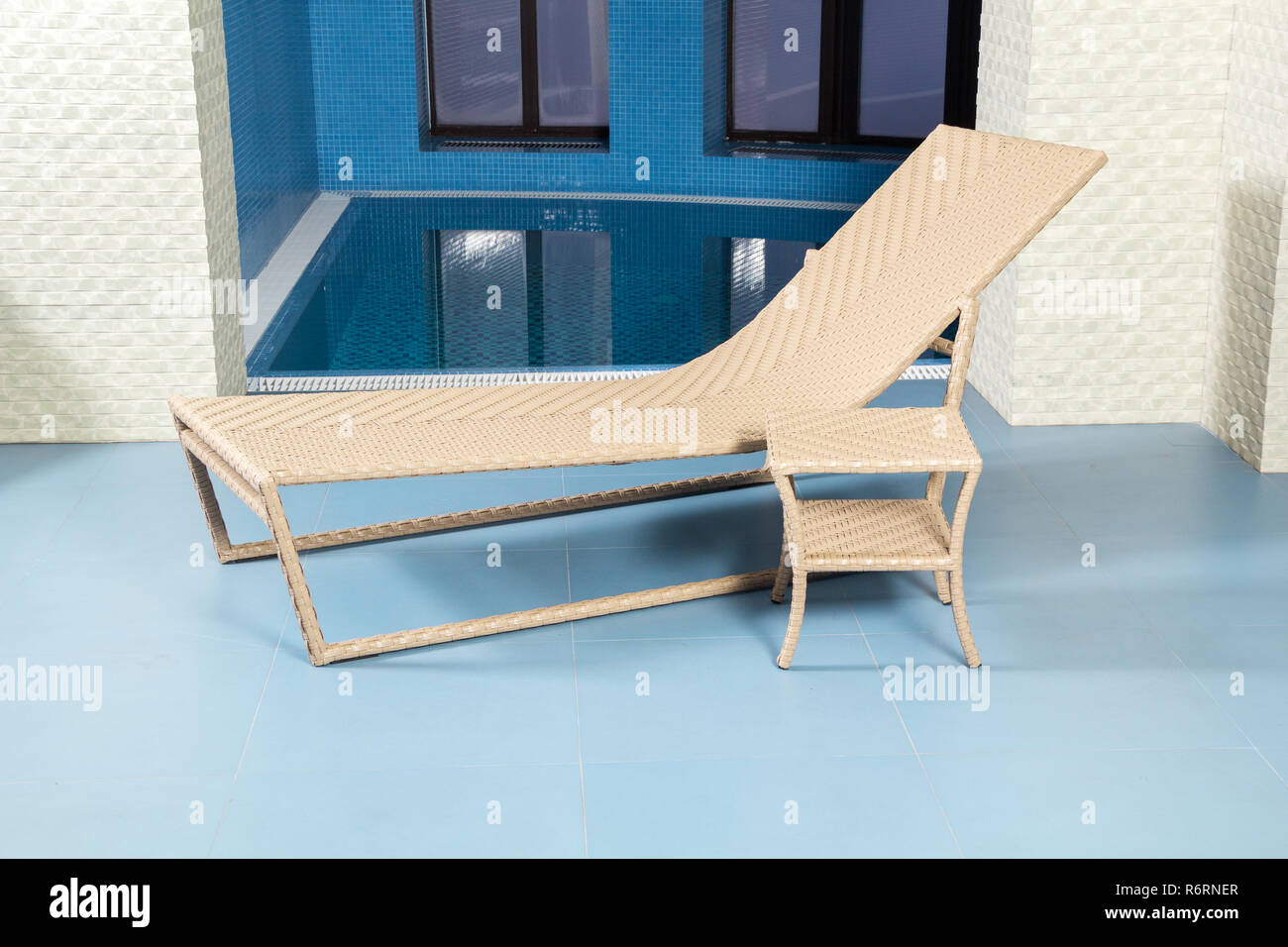 Chaise longue by pool Stock Photo Alamy