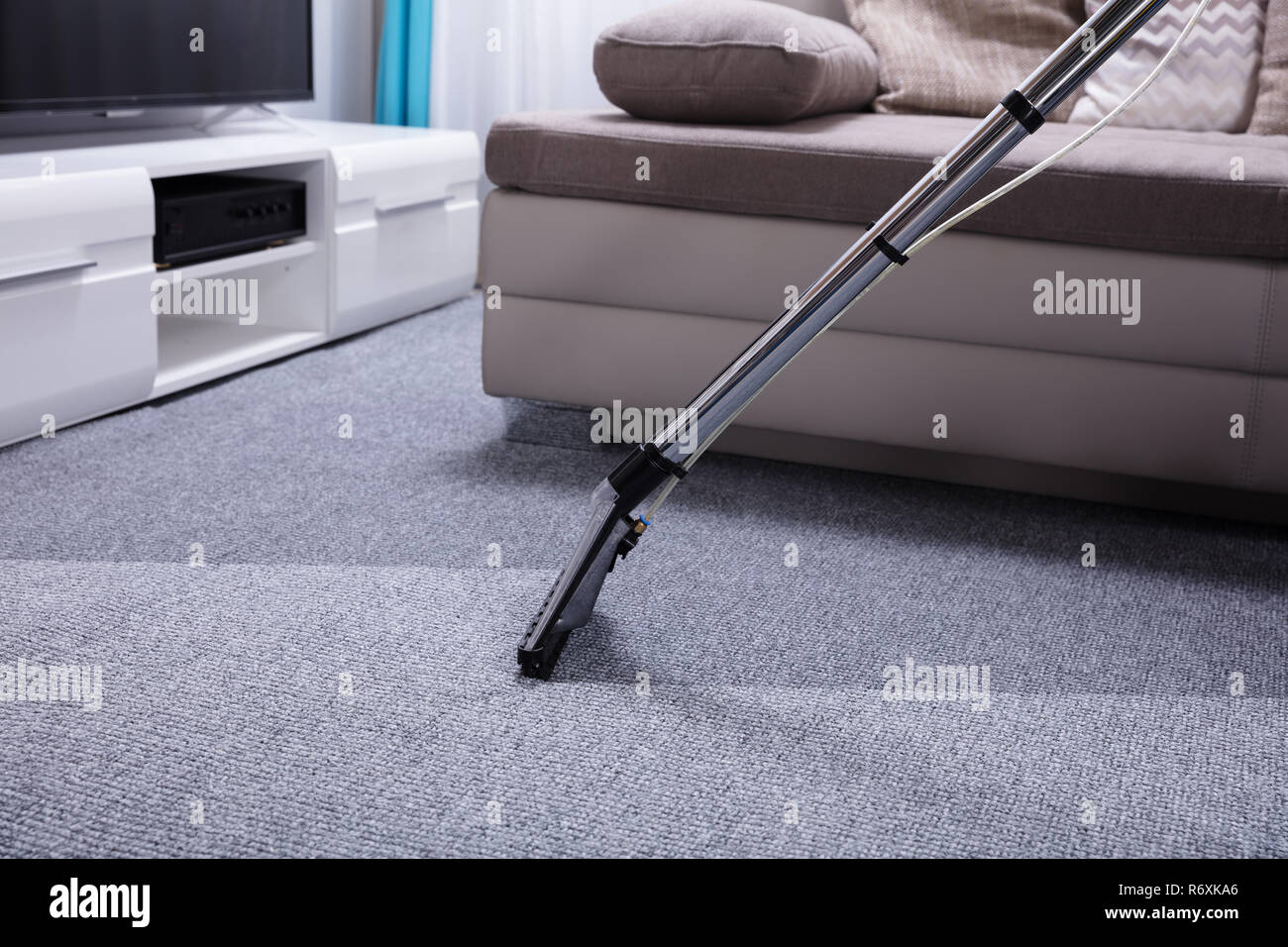 Vacuum Cleaner Over Carpet Stock Photo Alamy