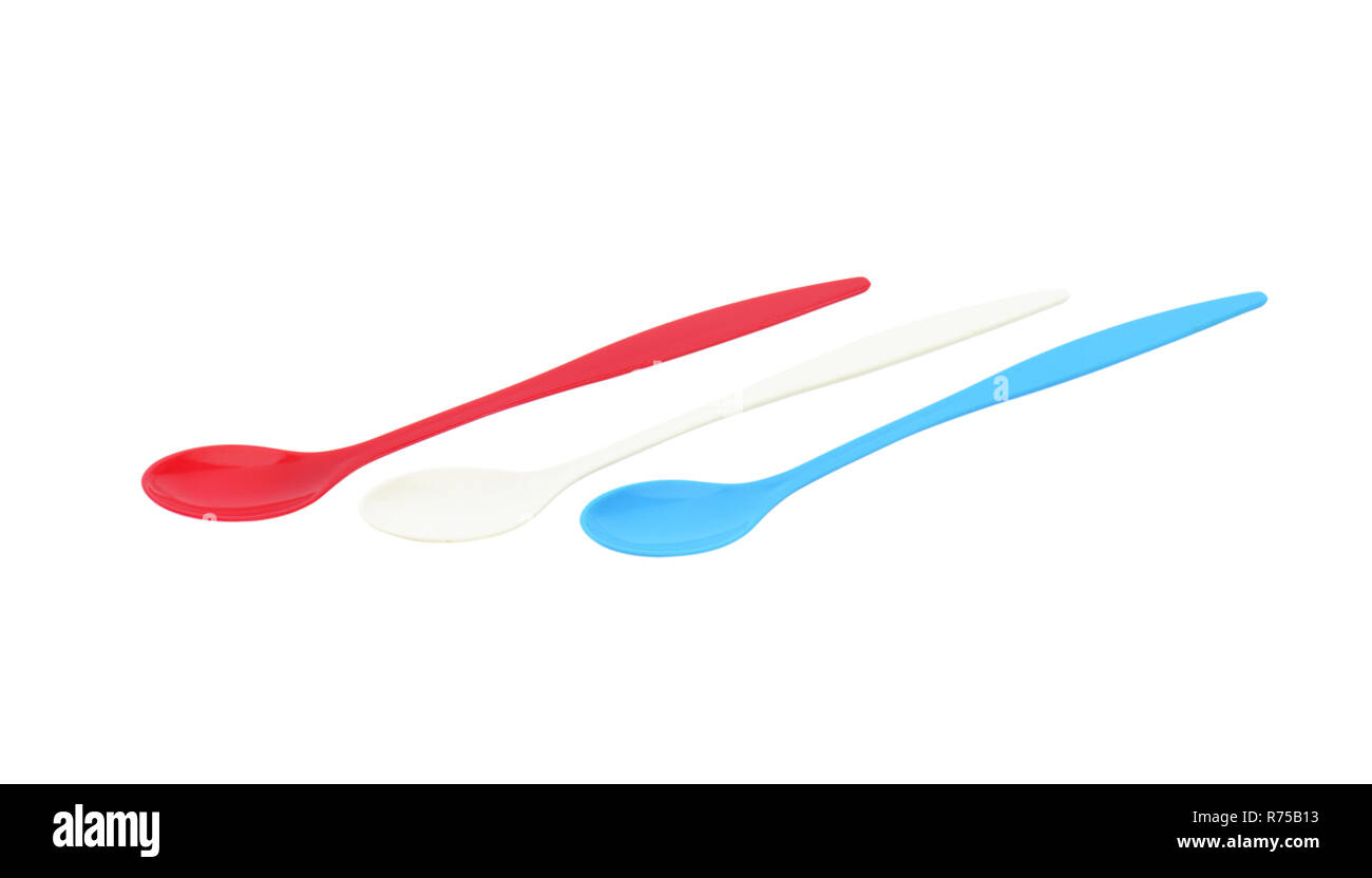 Three long plastic spoons Stock Photo Alamy