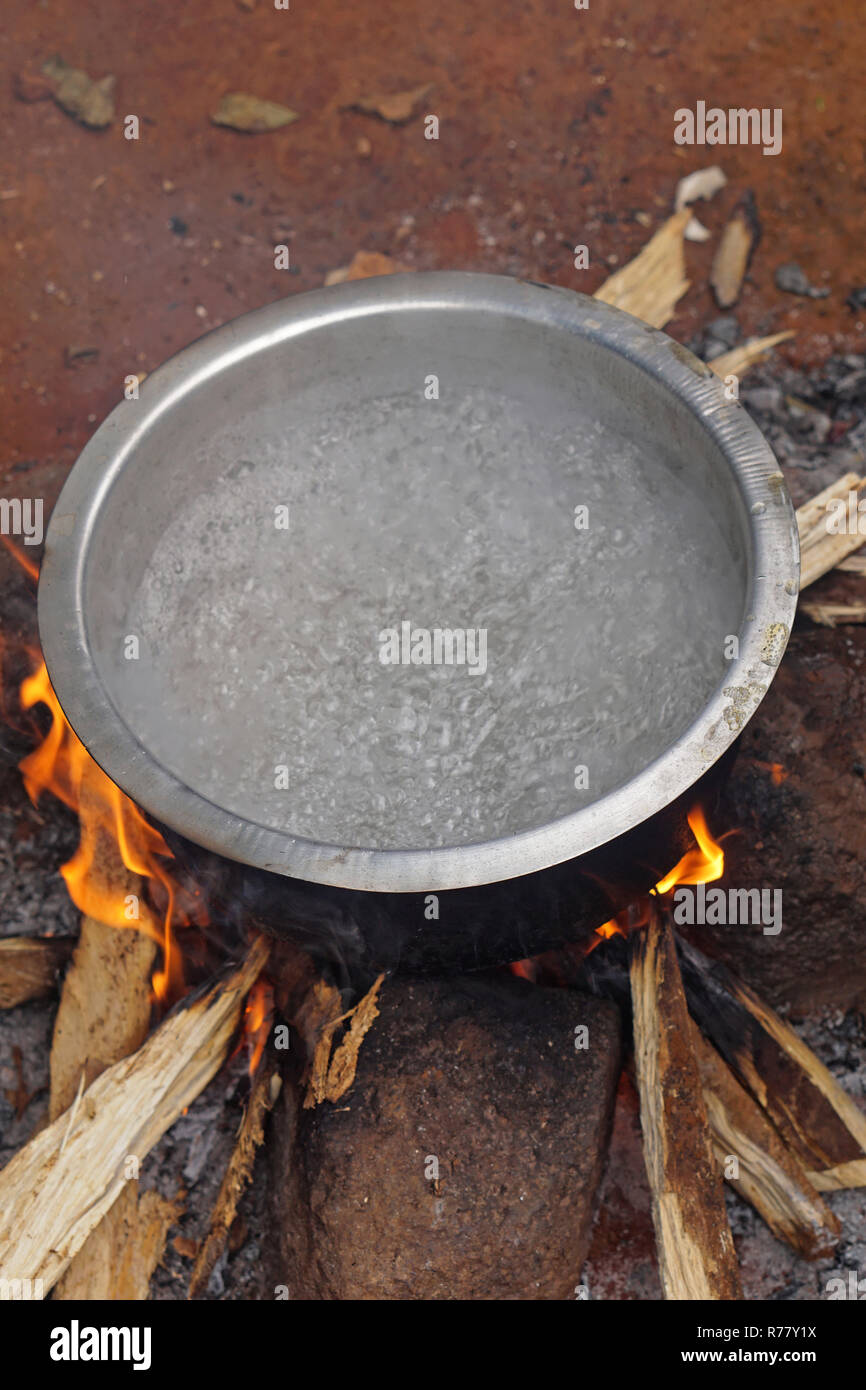 Boiling water over fire Stock Photo Alamy