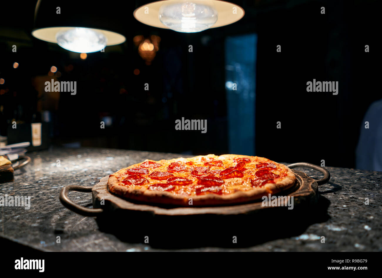 cook throws the pizza Stock Photo Alamy