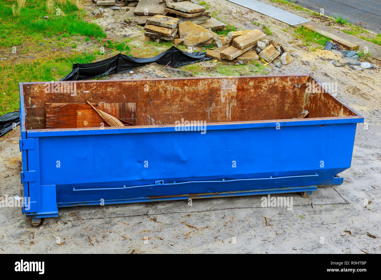 Construction wasted disposal bin used at the construction Stock Photo Alamy