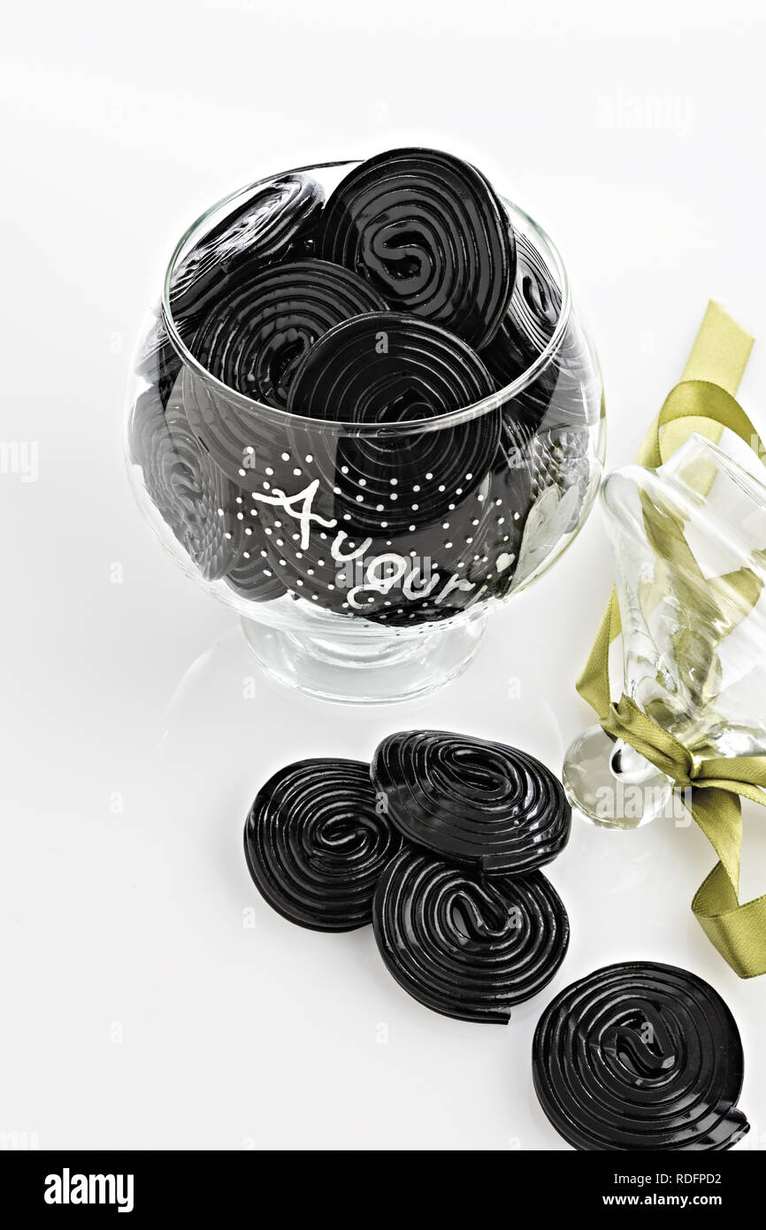 licorice wheels in glass jar from above Stock Photo Alamy