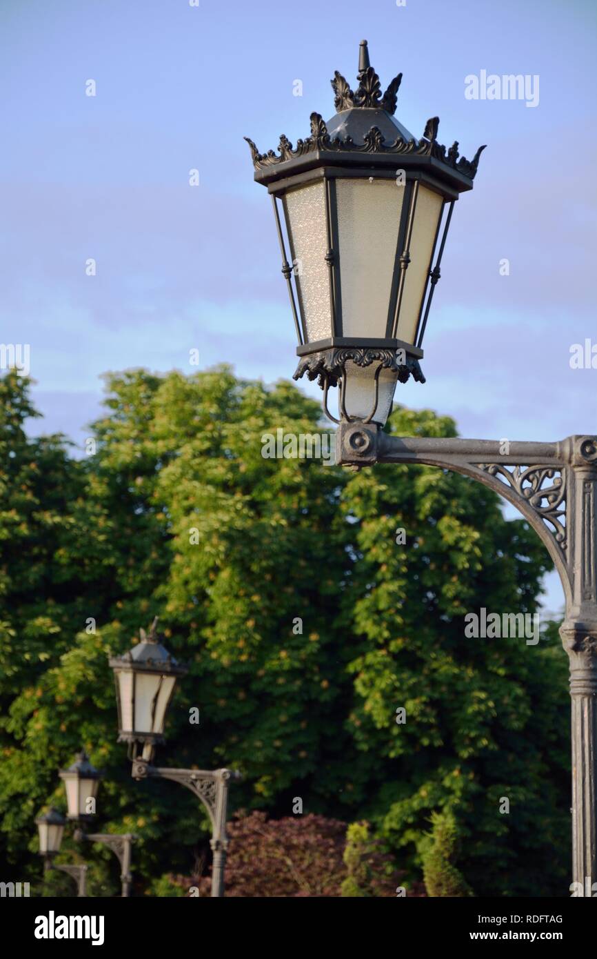 street lamps in a park Stock Photo Alamy