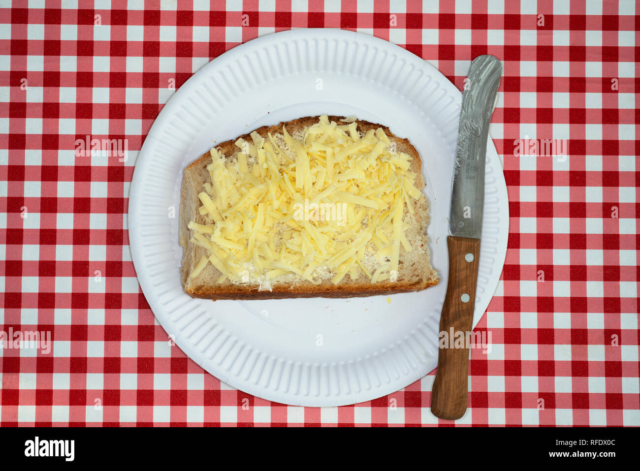 Grated cheddar cheese on sourdough bread Stock Photo Alamy