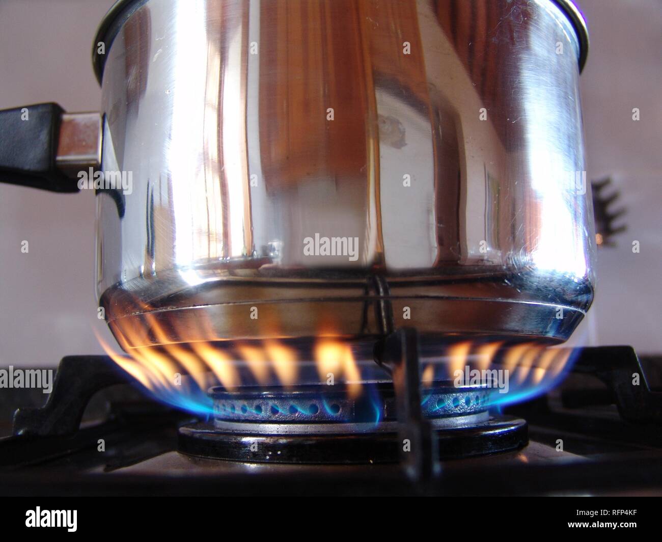 Cooking pot, gas stove, flame Stock Photo Alamy