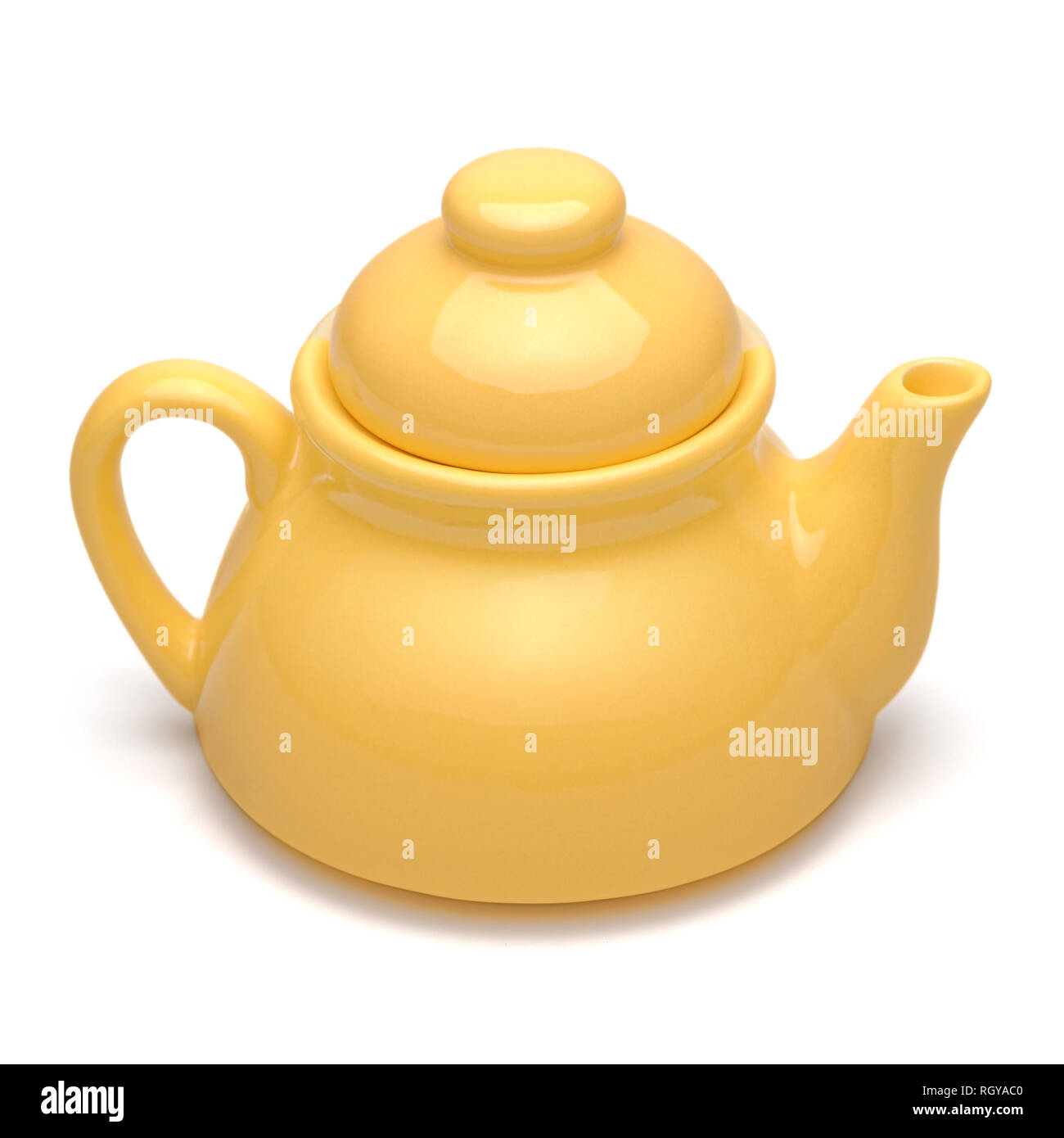 Isolated objects single small yellow teapot on white background Stock Photo Alamy