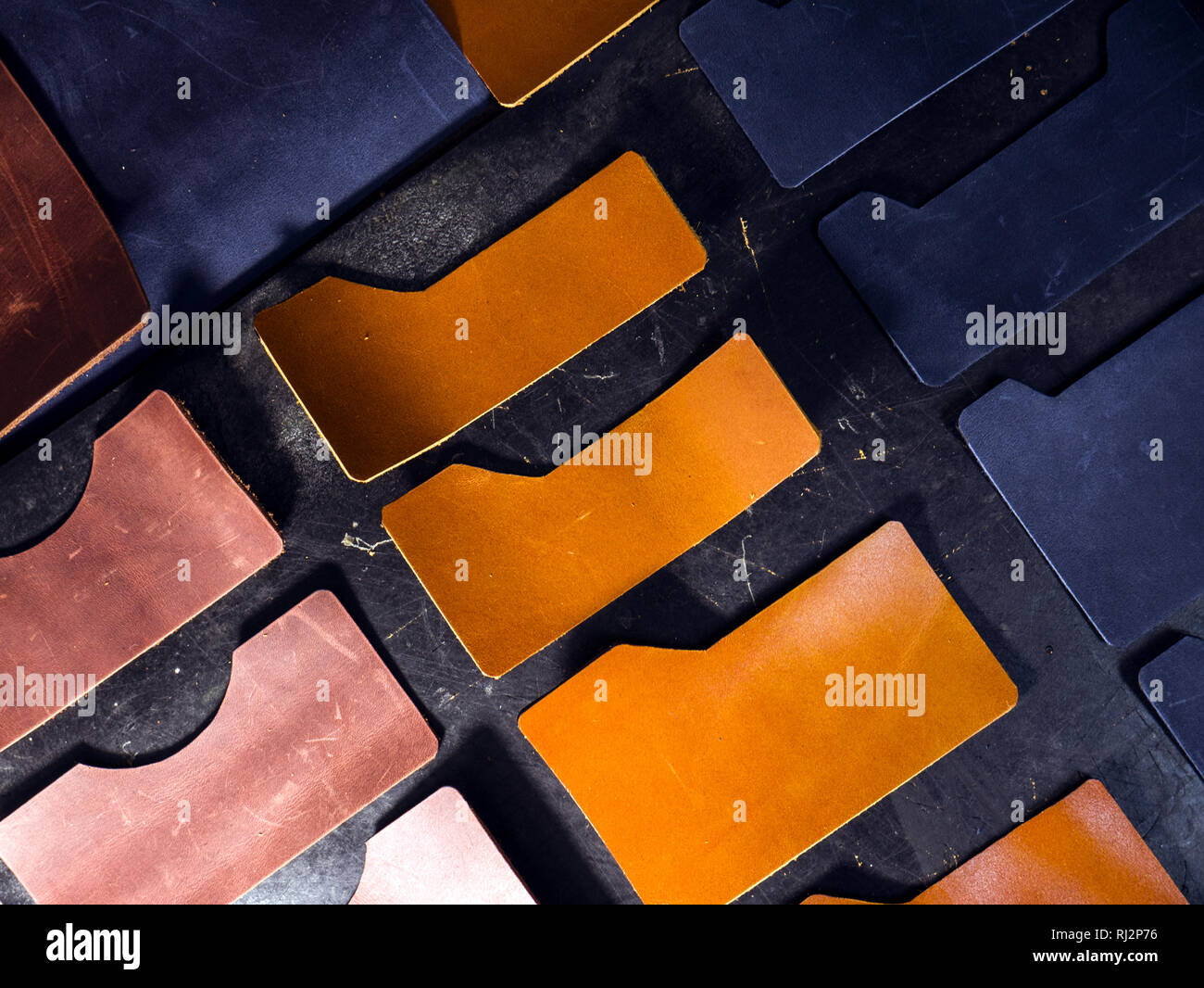 leather leather and tools on the table Stock Photo Alamy
