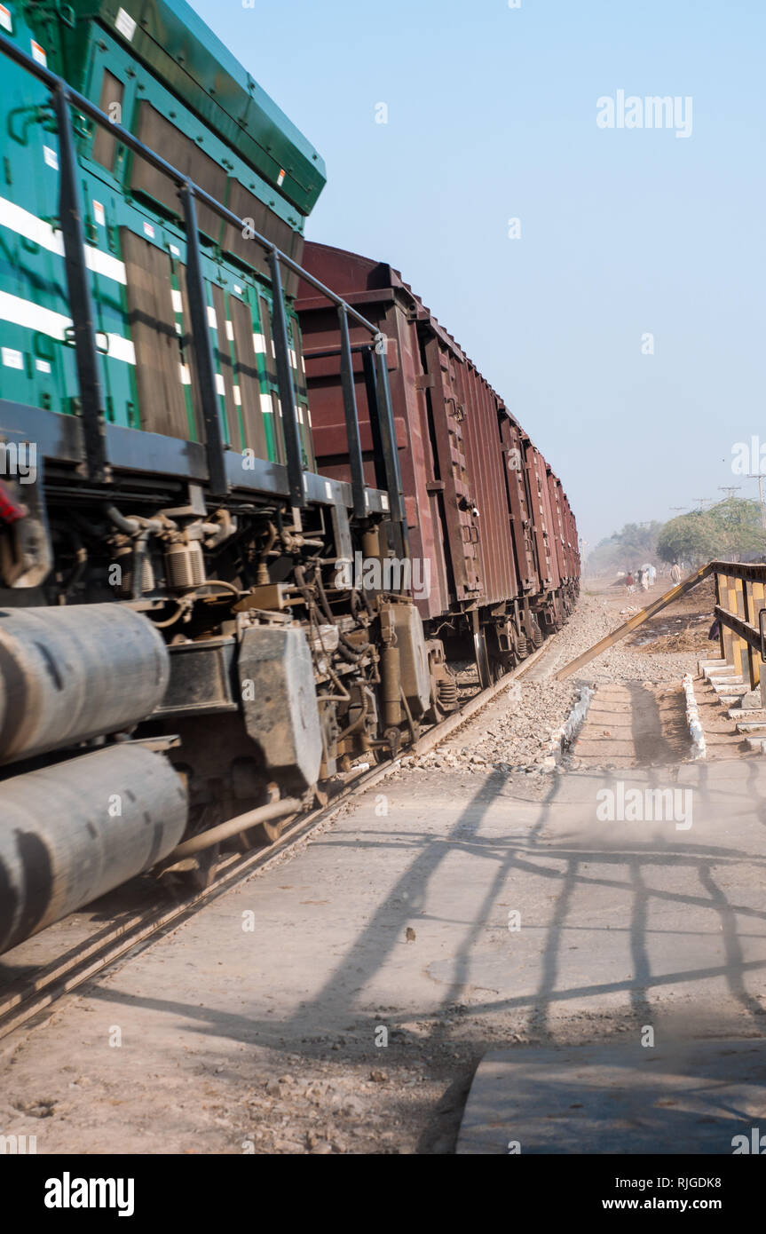 Freight train passing through the countryside Stock Photo Alamy