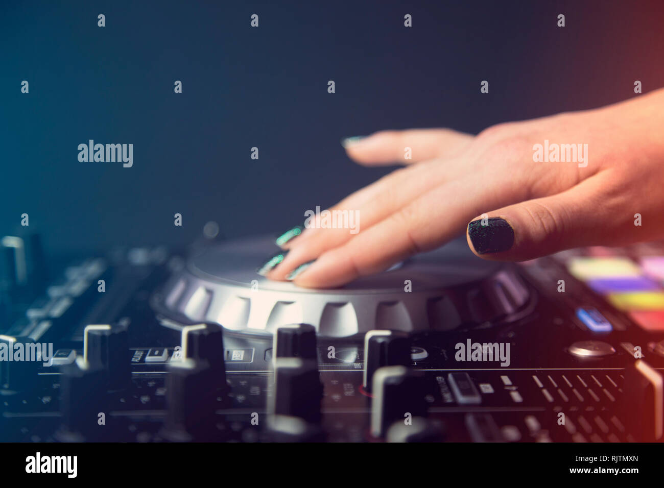 DJ Hand Mixing on Controller Stock Photo Alamy