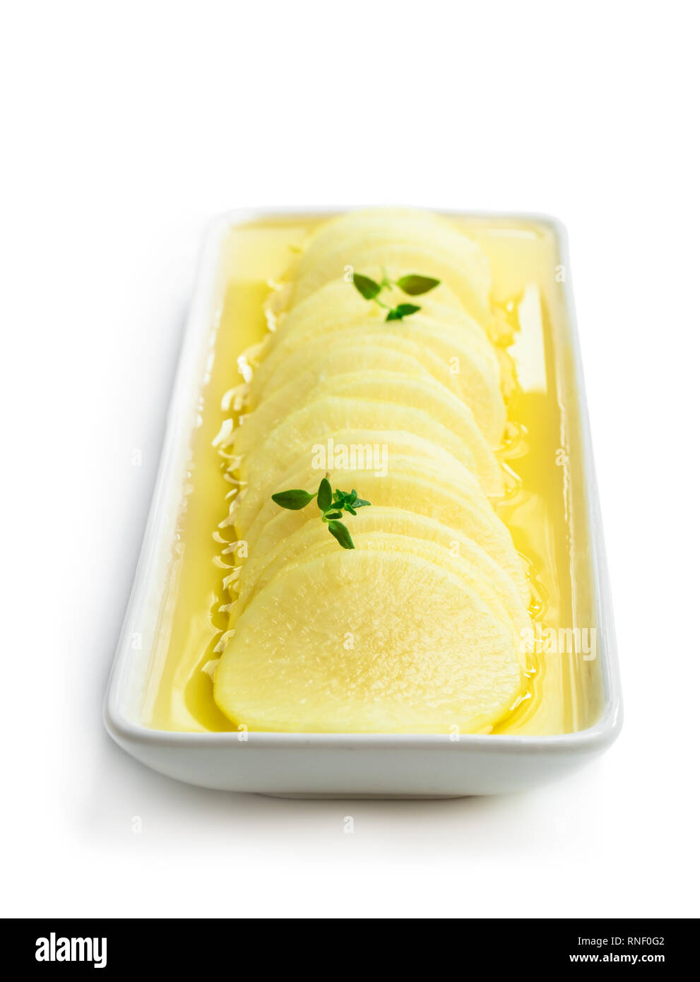 Marinated daikon isolated on white Stock Photo Alamy