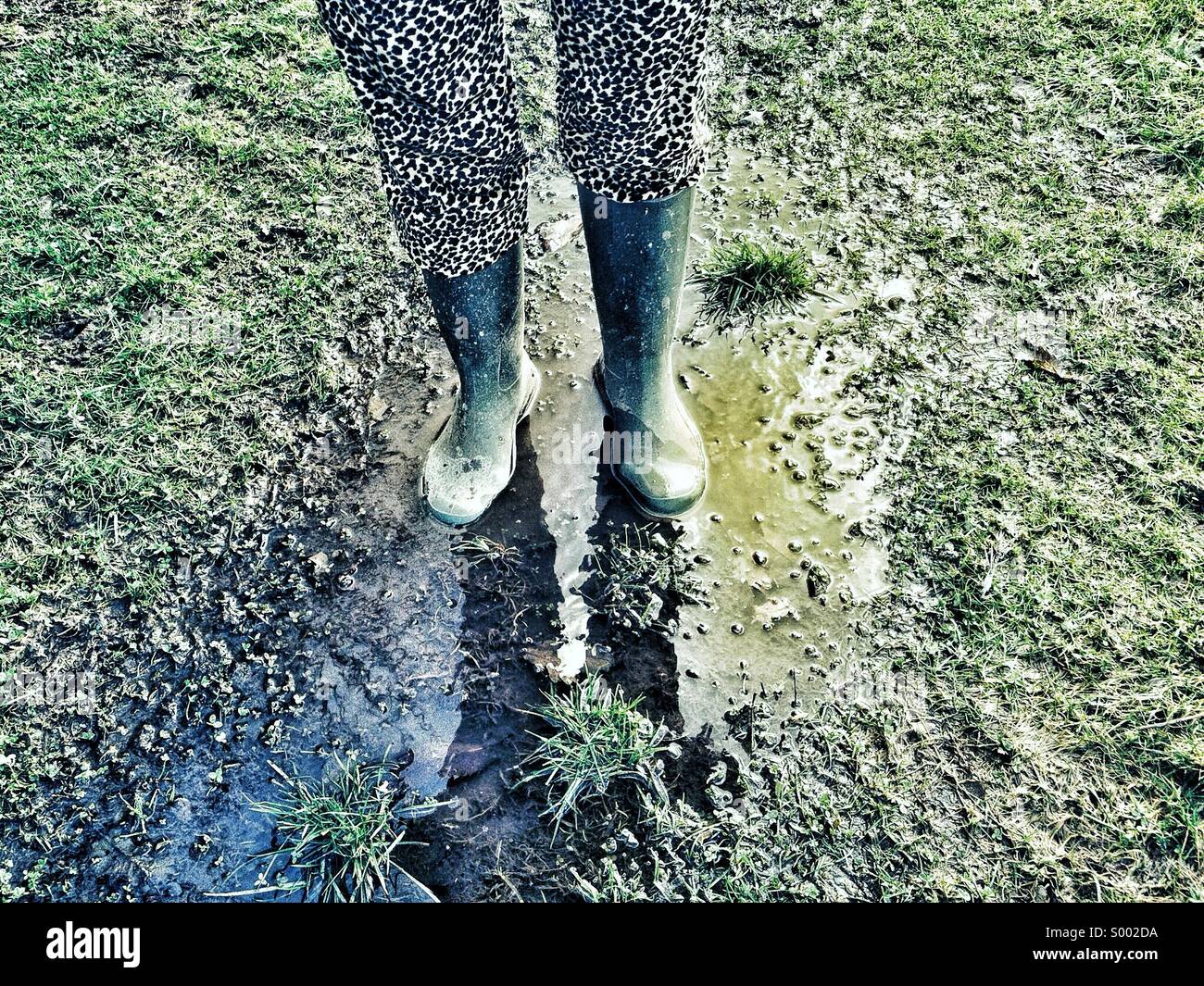 Muddy boots woman hires stock photography and images Alamy