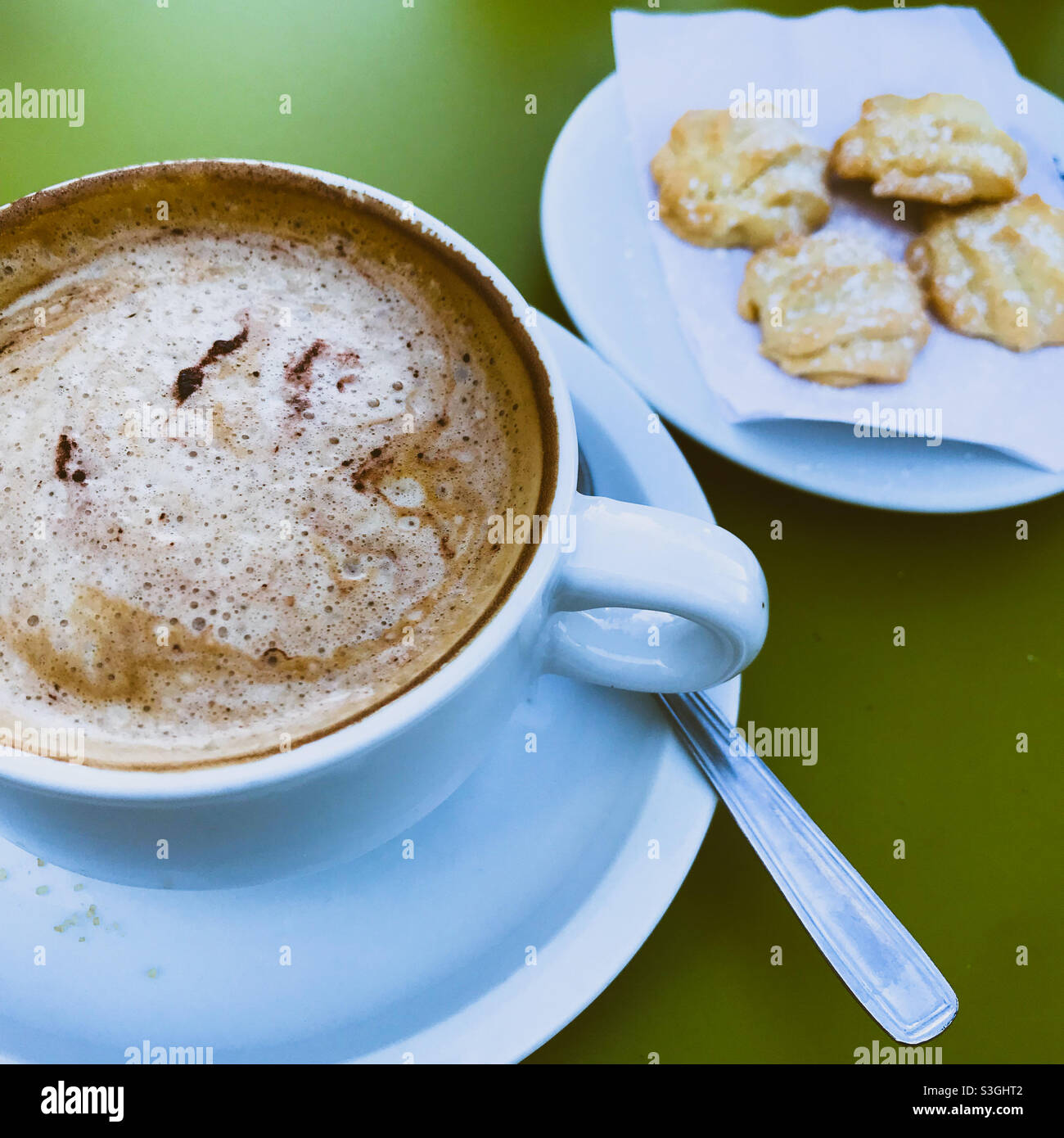 Cafe coffee and biscuits Stock Photo Alamy