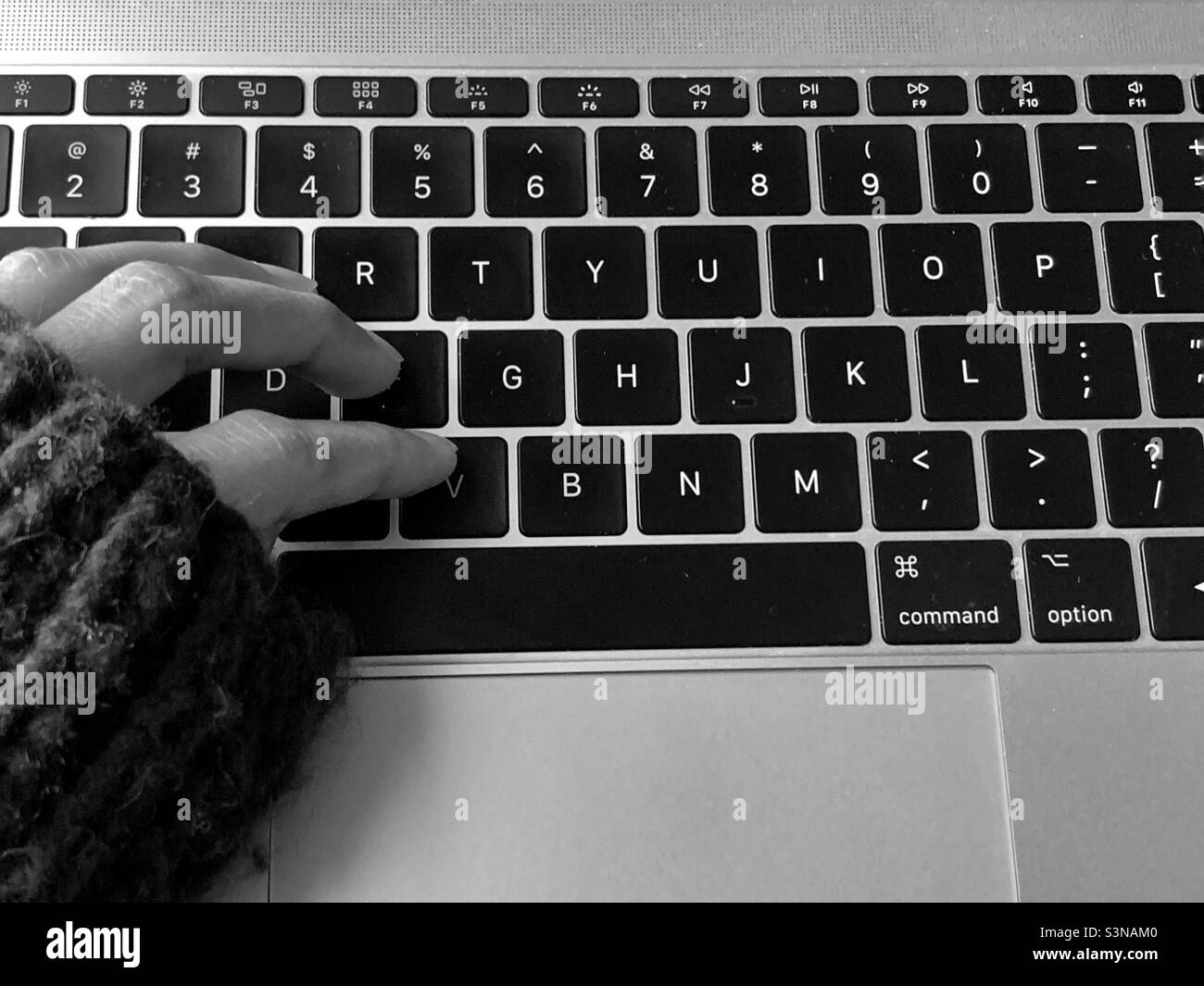 Typing with one hand Black and White Stock Photos & Images Alamy