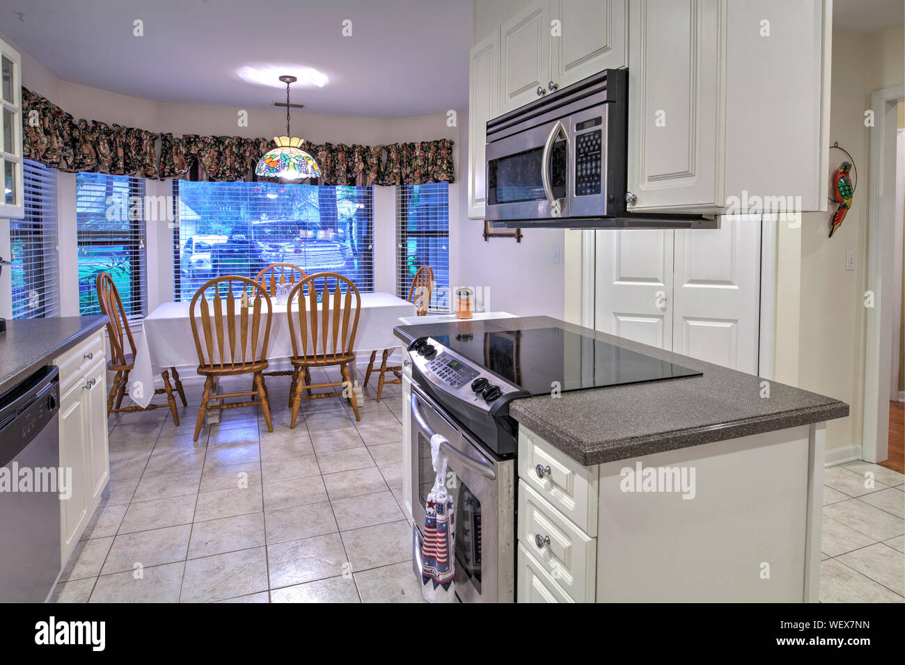 Simple dated kitchen with white Stock Photo Alamy