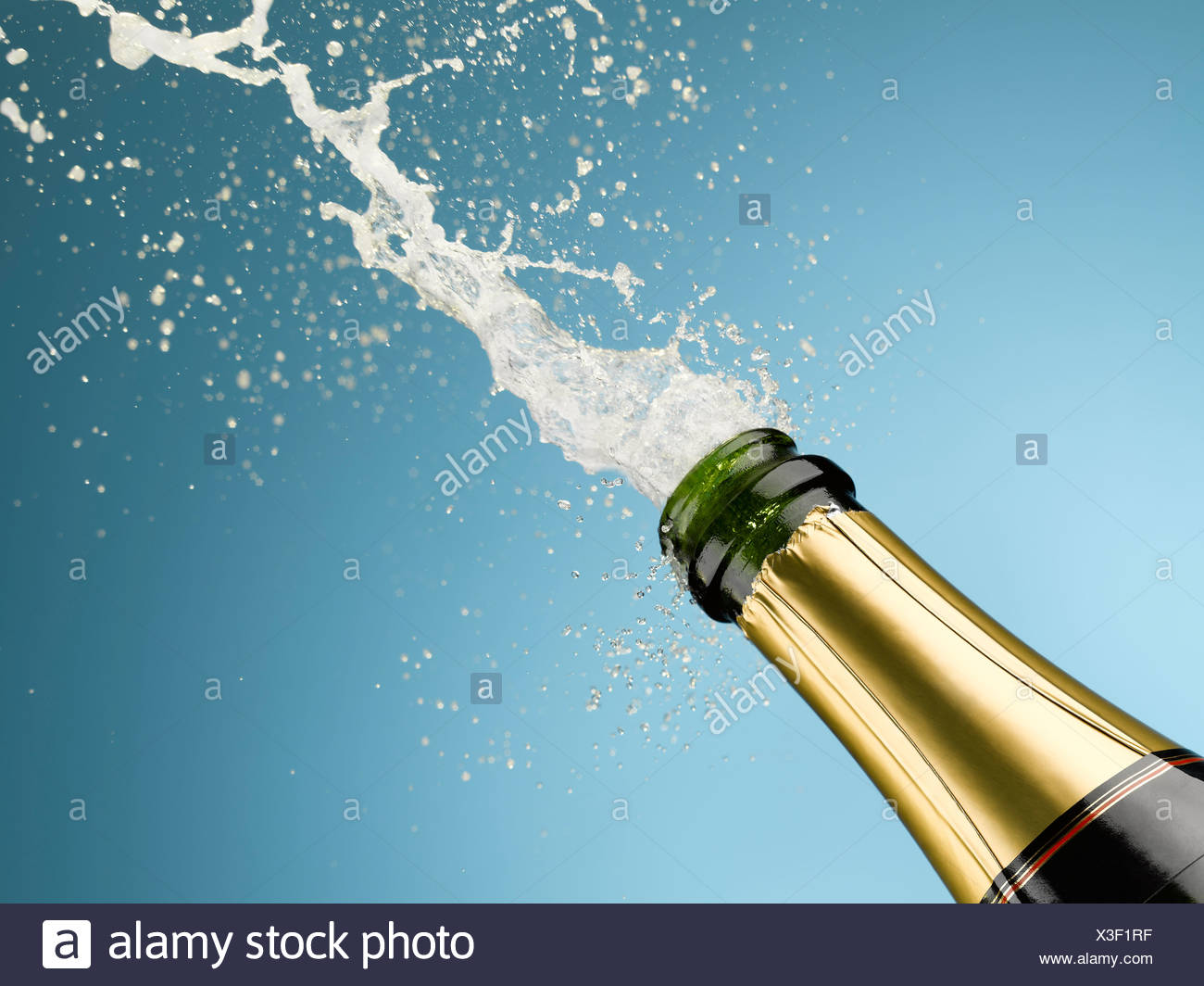 Champagne Bottle Exploding Stock Photos & Champagne Bottle Exploding