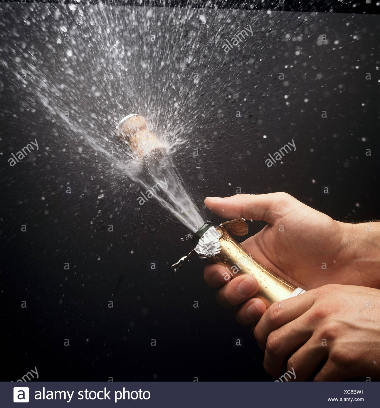 Popping Champagne Bottle Stock Photos & Popping Champagne Bottle Stock