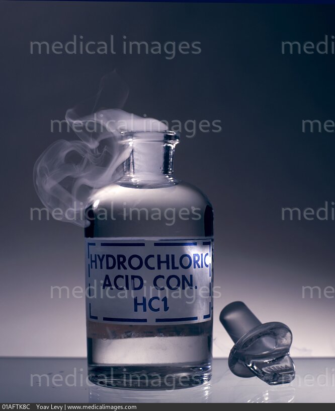 STOCK IMAGE, open bottle of concentrated hydrochloric acid hcl