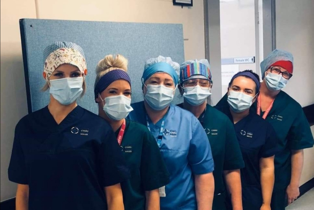 Volunteers make hundreds of headbands for nurses and carers