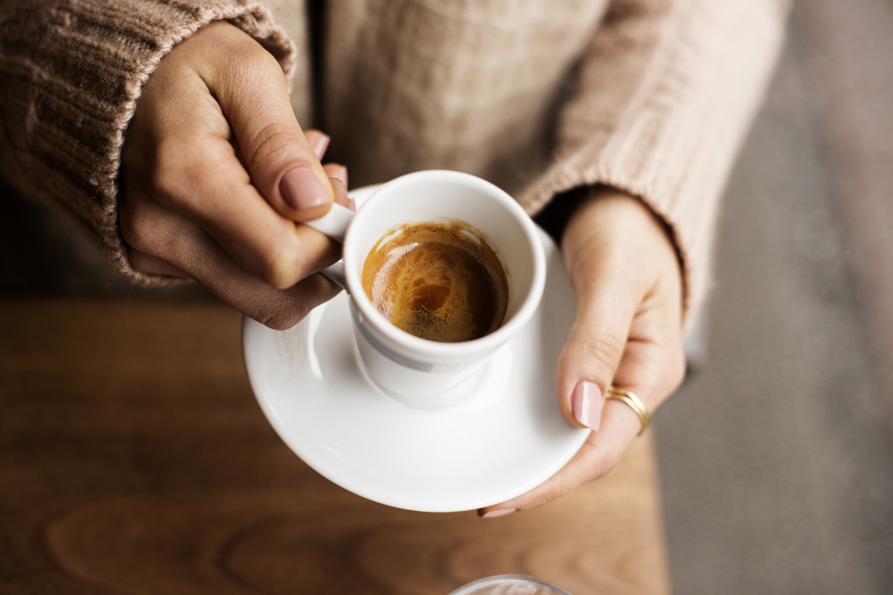 Coffee Cup, Lady’s hands holding Coffee Cup, Woman holding a white mug