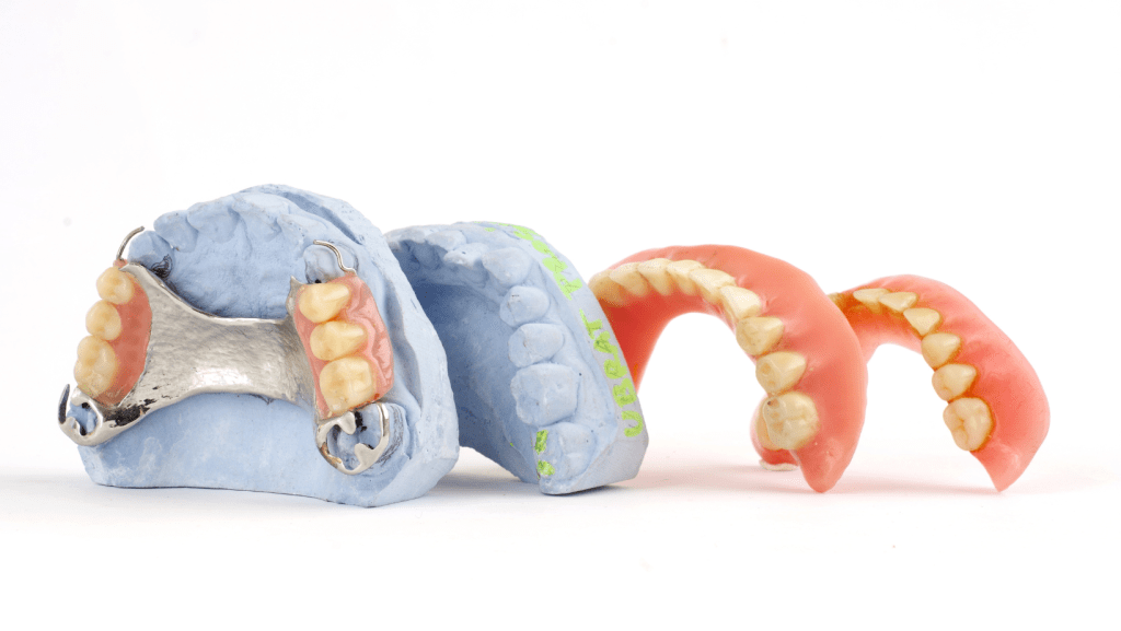 Foods To Avoid Eating with Partial Dentures • Cain Denture Centers