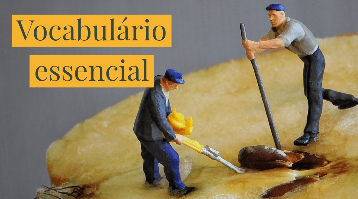 Texto Vocabulário essencial sobre dois bonecos em miniatura que retiram semente a uma maçã